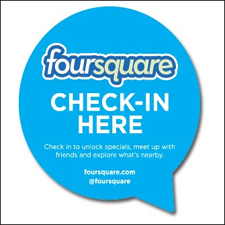 Bild: Hellblaue Sprechblase mit dem Schriftzug: "foursquare - Check-In Here."